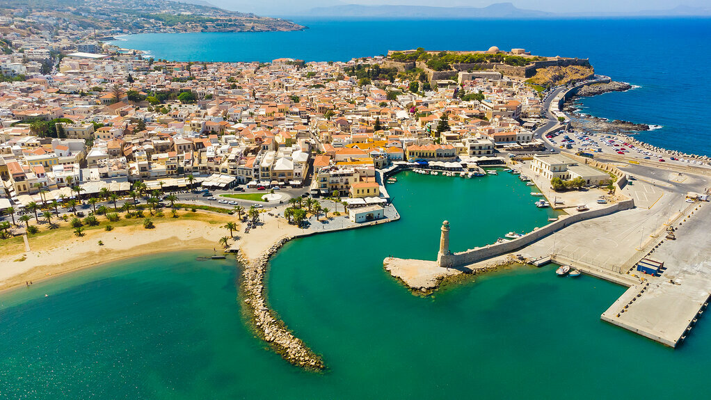 bigstock-Rethymno-Old-Port-With-Bars-An-444885656